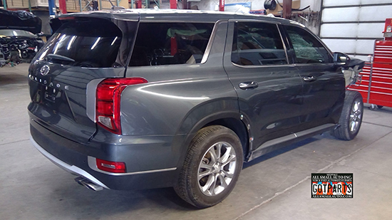A salvage Hyundai Palisade being parted out, providing a source for quality used OEM parts.